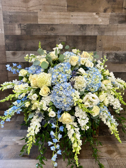 Blue and white casket spray –  Flowers By Steve, Inc., Haverhill MA